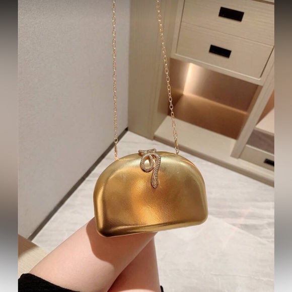 Gold Clutch with Snake Accent